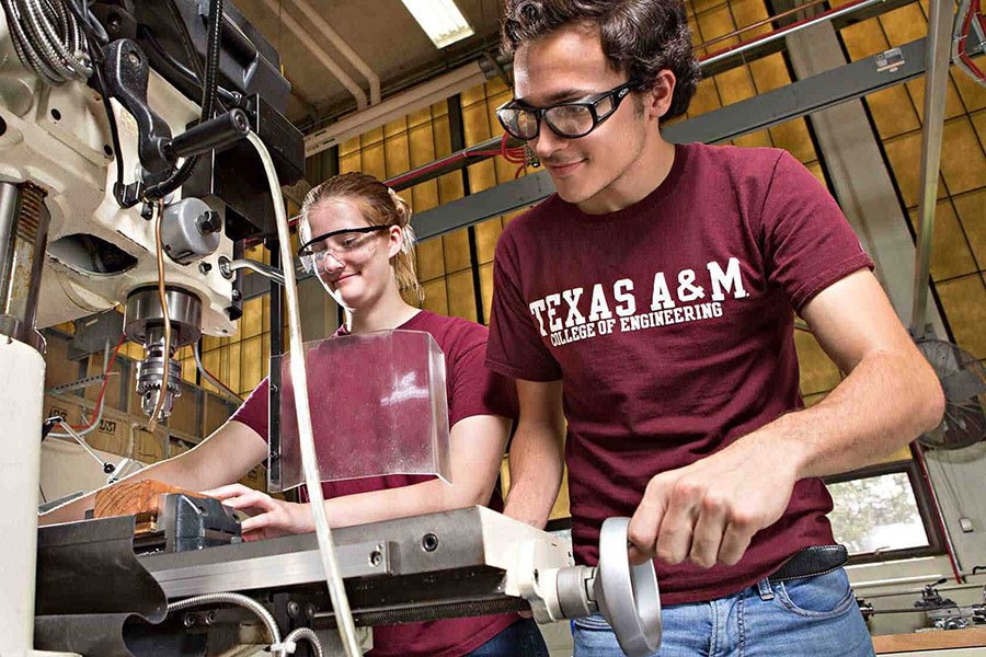 College of Engineering Students work in a machine shop on a class project
