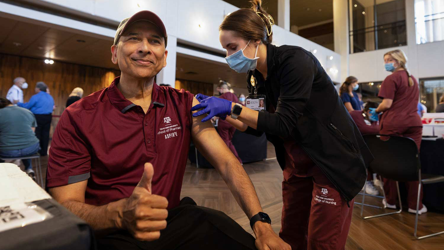 Texas A&M staff member receives a flu shot