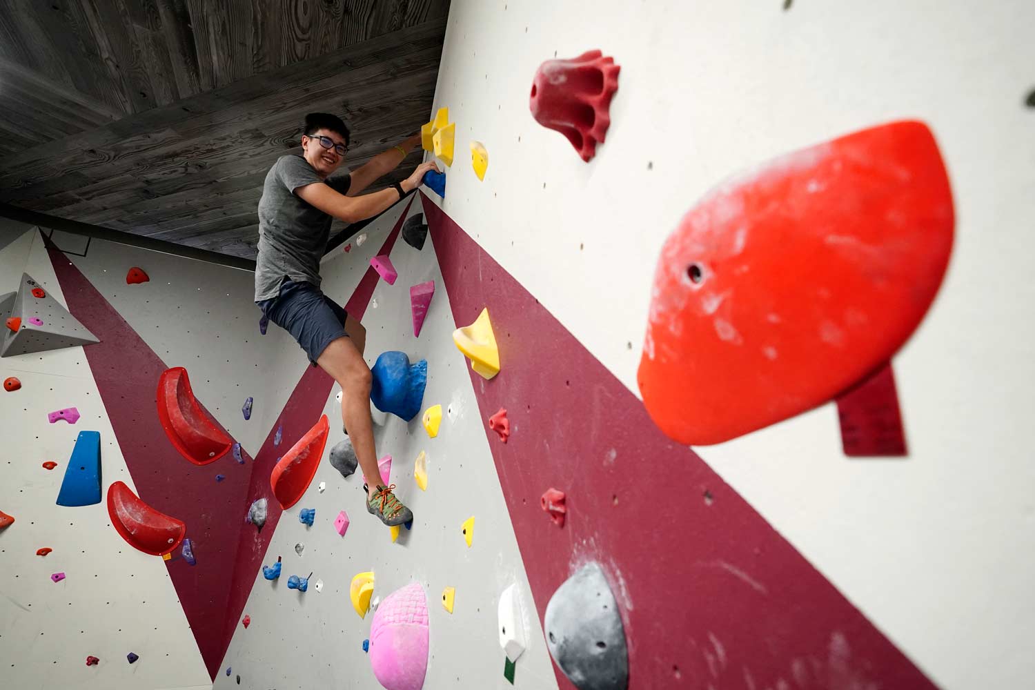 Student climbing on the southside student rec center rock climbing walls