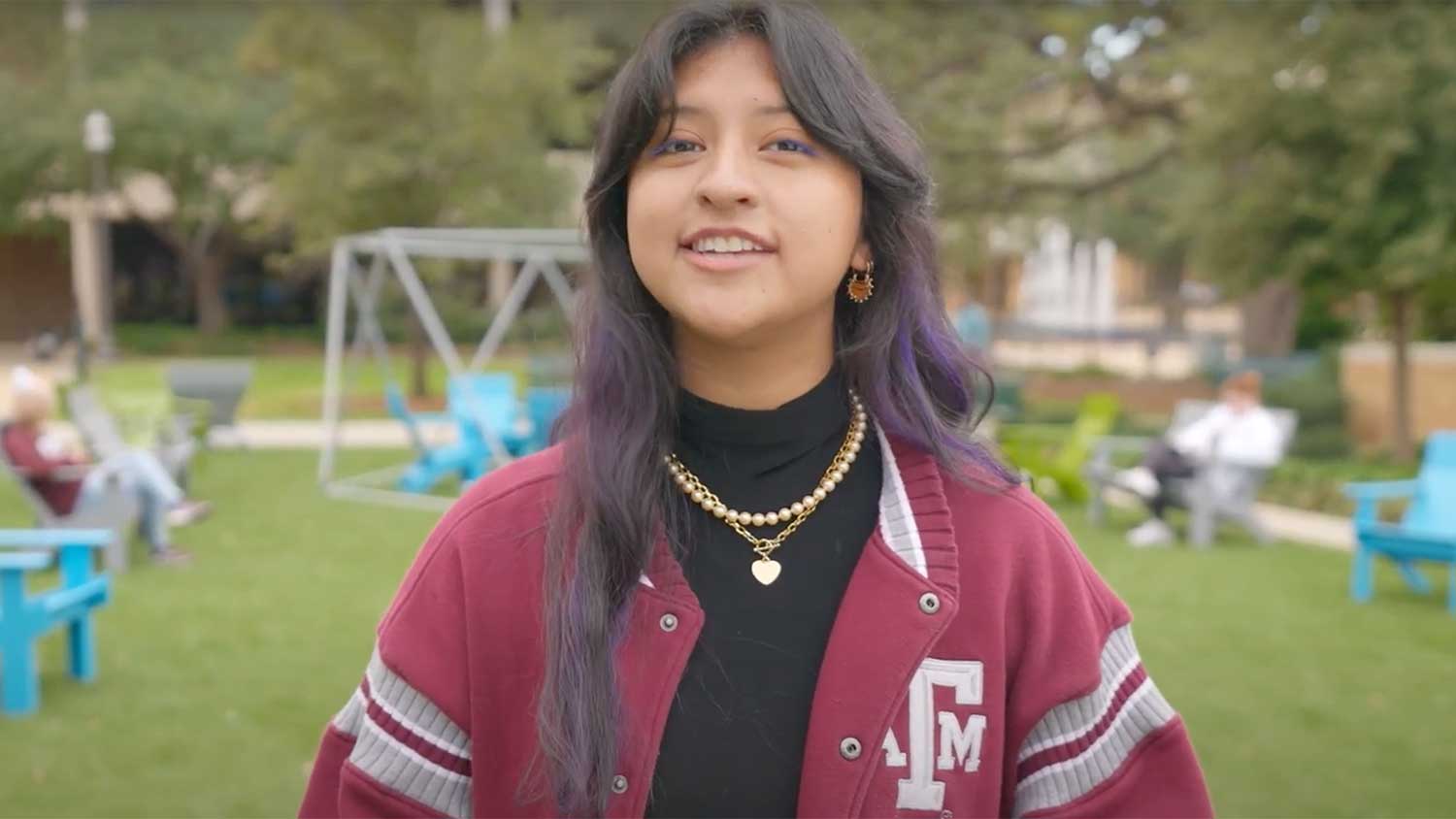 Campus tour video narrator student addressing the camera about coming to Texas A&M